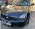 Черный Мицубиси Лансер, объемом двигателя 2 л и пробегом 267 тыс. км за 4500 $, фото 1 на Automoto.ua
