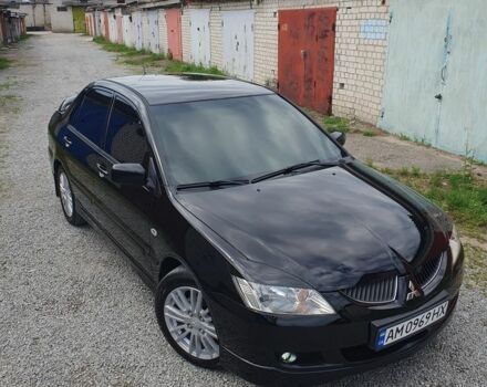 Чорний Міцубісі Lancer, об'ємом двигуна 1.6 л та пробігом 154 тис. км за 5500 $, фото 23 на Automoto.ua