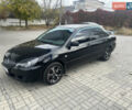 Чорний Міцубісі Lancer, об'ємом двигуна 1.58 л та пробігом 364 тис. км за 4000 $, фото 2 на Automoto.ua