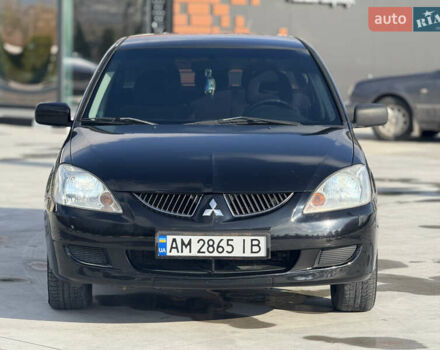 Чорний Міцубісі Lancer, об'ємом двигуна 1.6 л та пробігом 205 тис. км за 3650 $, фото 5 на Automoto.ua