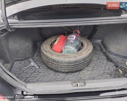 Міцубісі Lancer 2005 у Запоріжжя на Automoto.ua Чорний Міцубісі Lancer, об'ємом двигуна 1.58 л та пробігом 186 тис. км за 4700 $, фото 9 на Automoto.ua