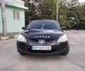 Черный Мицубиси Лансер, объемом двигателя 1.6 л и пробегом 332 тыс. км за 3900 $, фото 1 на Automoto.ua
