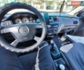 Черный Мицубиси Лансер, объемом двигателя 1.58 л и пробегом 273 тыс. км за 4500 $, фото 1 на Automoto.ua