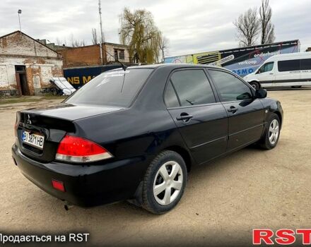 Чорний Міцубісі Lancer, об'ємом двигуна 1.6 л та пробігом 250 тис. км за 3700 $, фото 4 на Automoto.ua