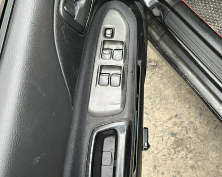 Черный Мицубиси Лансер, объемом двигателя 1.58 л и пробегом 360 тыс. км за 1500 $, фото 11 на Automoto.ua