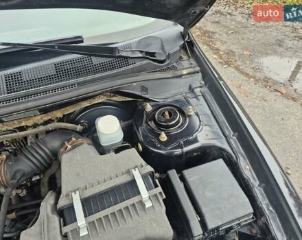 Черный Мицубиси Лансер, объемом двигателя 1.58 л и пробегом 280 тыс. км за 3200 $, фото 15 на Automoto.ua