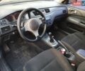 Чорний Міцубісі Lancer, об'ємом двигуна 2 л та пробігом 258 тис. км за 2999 $, фото 13 на Automoto.ua