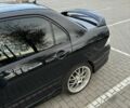 Черный Мицубиси Лансер, объемом двигателя 2 л и пробегом 270 тыс. км за 5200 $, фото 2 на Automoto.ua