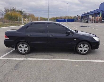 Міцубісі Lancer 2005 у Запоріжжя на Automoto.ua Чорний Міцубісі Lancer, об'ємом двигуна 1.58 л та пробігом 186 тис. км за 4700 $, фото 1 на Automoto.ua