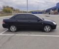 Міцубісі Lancer 2005 у Запоріжжя на Automoto.ua Чорний Міцубісі Lancer, об'ємом двигуна 1.58 л та пробігом 186 тис. км за 4700 $, фото 1 на Automoto.ua