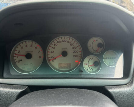 Черный Мицубиси Лансер, объемом двигателя 1.58 л и пробегом 264 тыс. км за 4600 $, фото 3 на Automoto.ua