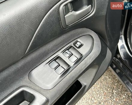 Чорний Міцубісі Lancer, об'ємом двигуна 1.58 л та пробігом 390 тис. км за 4500 $, фото 14 на Automoto.ua