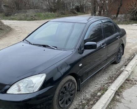 Чорний Міцубісі Lancer, об'ємом двигуна 1.6 л та пробігом 250 тис. км за 3500 $, фото 8 на Automoto.ua