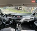 Черный Мицубиси Лансер, объемом двигателя 1.6 л и пробегом 260 тыс. км за 2300 $, фото 33 на Automoto.ua