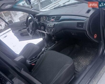 Чорний Міцубісі Lancer, об'ємом двигуна 1.6 л та пробігом 275 тис. км за 2999 $, фото 10 на Automoto.ua