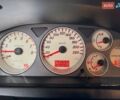 Черный Мицубиси Лансер, объемом двигателя 1.58 л и пробегом 249 тыс. км за 5000 $, фото 35 на Automoto.ua