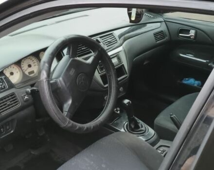 Чорний Міцубісі Lancer, об'ємом двигуна 1.6 л та пробігом 261 тис. км за 4400 $, фото 7 на Automoto.ua