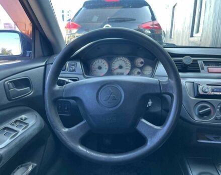 Чорний Міцубісі Lancer, об'ємом двигуна 2 л та пробігом 310 тис. км за 4990 $, фото 14 на Automoto.ua