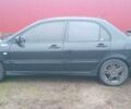 Чорний Міцубісі Lancer, об'ємом двигуна 2 л та пробігом 270 тис. км за 3200 $, фото 1 на Automoto.ua