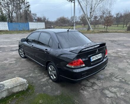 Чорний Міцубісі Lancer, об'ємом двигуна 1.6 л та пробігом 154 тис. км за 5500 $, фото 9 на Automoto.ua