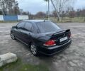Чорний Міцубісі Lancer, об'ємом двигуна 1.6 л та пробігом 154 тис. км за 5500 $, фото 9 на Automoto.ua