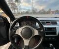 Черный Мицубиси Лансер, объемом двигателя 2 л и пробегом 270 тыс. км за 5200 $, фото 7 на Automoto.ua