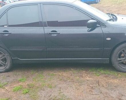 Черный Мицубиси Лансер, объемом двигателя 2 л и пробегом 270 тыс. км за 3200 $, фото 4 на Automoto.ua