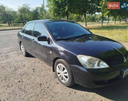 Чорний Міцубісі Lancer, об'ємом двигуна 1.6 л та пробігом 276 тис. км за 4000 $, фото 3 на Automoto.ua