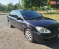 Чорний Міцубісі Lancer, об'ємом двигуна 1.6 л та пробігом 276 тис. км за 4000 $, фото 3 на Automoto.ua