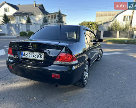Мицубиси Лансер 2005 в Виннице на Automoto.ua Черный Мицубиси Лансер, объемом двигателя 1.6 л и пробегом 261 тыс. км за 4100 $, фото 14 на Automoto.ua