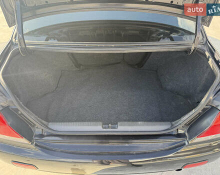 Чорний Міцубісі Lancer, об'ємом двигуна 1.6 л та пробігом 205 тис. км за 3650 $, фото 13 на Automoto.ua