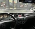 Мицубиси Лансер 2005 в Каменское - Днепродзержинск на Automoto.ua Черный Мицубиси Лансер, объемом двигателя 1.6 л и пробегом 280 тыс. км за 4500 $, фото 13 на Automoto.ua