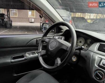 Мицубиси Лансер 2005 в Одессе на Automoto.ua Черный Мицубиси Лансер, объемом двигателя 1.58 л и пробегом 206 тыс. км за 3900 $, фото 19 на Automoto.ua