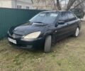 Чорний Міцубісі Lancer, об'ємом двигуна 1.58 л та пробігом 279 тис. км за 4000 $, фото 1 на Automoto.ua
