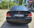 Черный Мицубиси Лансер, объемом двигателя 1.58 л и пробегом 352 тыс. км за 4000 $, фото 3 на Automoto.ua