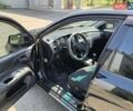 Черный Мицубиси Лансер, объемом двигателя 1.58 л и пробегом 352 тыс. км за 4000 $, фото 7 на Automoto.ua