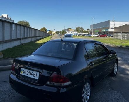 Чорний Міцубісі Lancer, об'ємом двигуна 1.6 л та пробігом 1 тис. км за 1750 $, фото 2 на Automoto.ua