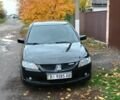 Чорний Міцубісі Lancer, об'ємом двигуна 1.6 л та пробігом 261 тис. км за 4400 $, фото 1 на Automoto.ua