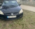 Чорний Міцубісі Lancer, об'ємом двигуна 1.58 л та пробігом 279 тис. км за 4000 $, фото 3 на Automoto.ua