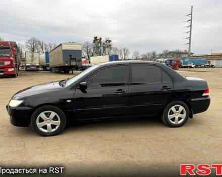 Чорний Міцубісі Lancer, об'ємом двигуна 1.6 л та пробігом 250 тис. км за 3700 $, фото 1 на Automoto.ua