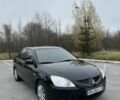 Черный Мицубиси Лансер, объемом двигателя 1.6 л и пробегом 200 тыс. км за 3500 $, фото 7 на Automoto.ua