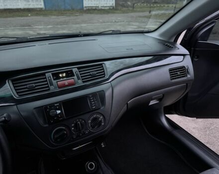 Чорний Міцубісі Lancer, об'ємом двигуна 1.6 л та пробігом 154 тис. км за 5500 $, фото 21 на Automoto.ua