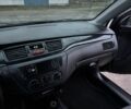 Чорний Міцубісі Lancer, об'ємом двигуна 1.6 л та пробігом 154 тис. км за 5500 $, фото 21 на Automoto.ua