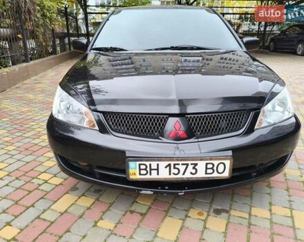Мицубиси Лансер 2005 в Одессе на Automoto.ua Черный Мицубиси Лансер, объемом двигателя 1.58 л и пробегом 206 тыс. км за 3900 $, фото 8 на Automoto.ua