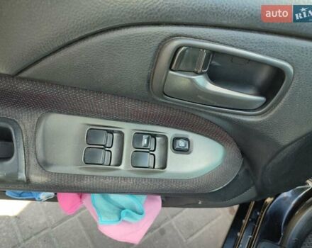 Черный Мицубиси Лансер, объемом двигателя 1.58 л и пробегом 128 тыс. км за 4600 $, фото 19 на Automoto.ua