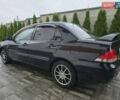 Черный Мицубиси Лансер, объемом двигателя 1.6 л и пробегом 98 тыс. км за 5500 $, фото 4 на Automoto.ua
