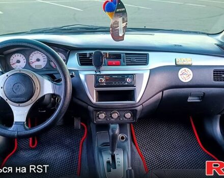 Чорний Міцубісі Lancer, об'ємом двигуна 2 л та пробігом 173 тис. км за 5200 $, фото 3 на Automoto.ua