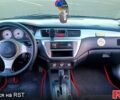 Чорний Міцубісі Lancer, об'ємом двигуна 2 л та пробігом 173 тис. км за 5200 $, фото 3 на Automoto.ua