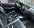 Чорний Міцубісі Lancer, об'ємом двигуна 1.59 л та пробігом 305 тис. км за 2950 $, фото 7 на Automoto.ua