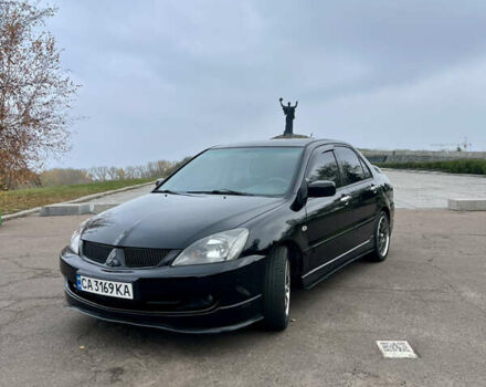 Чорний Міцубісі Lancer, об'ємом двигуна 2 л та пробігом 242 тис. км за 5900 $, фото 7 на Automoto.ua